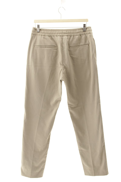Pantalón beige relaxed fit
