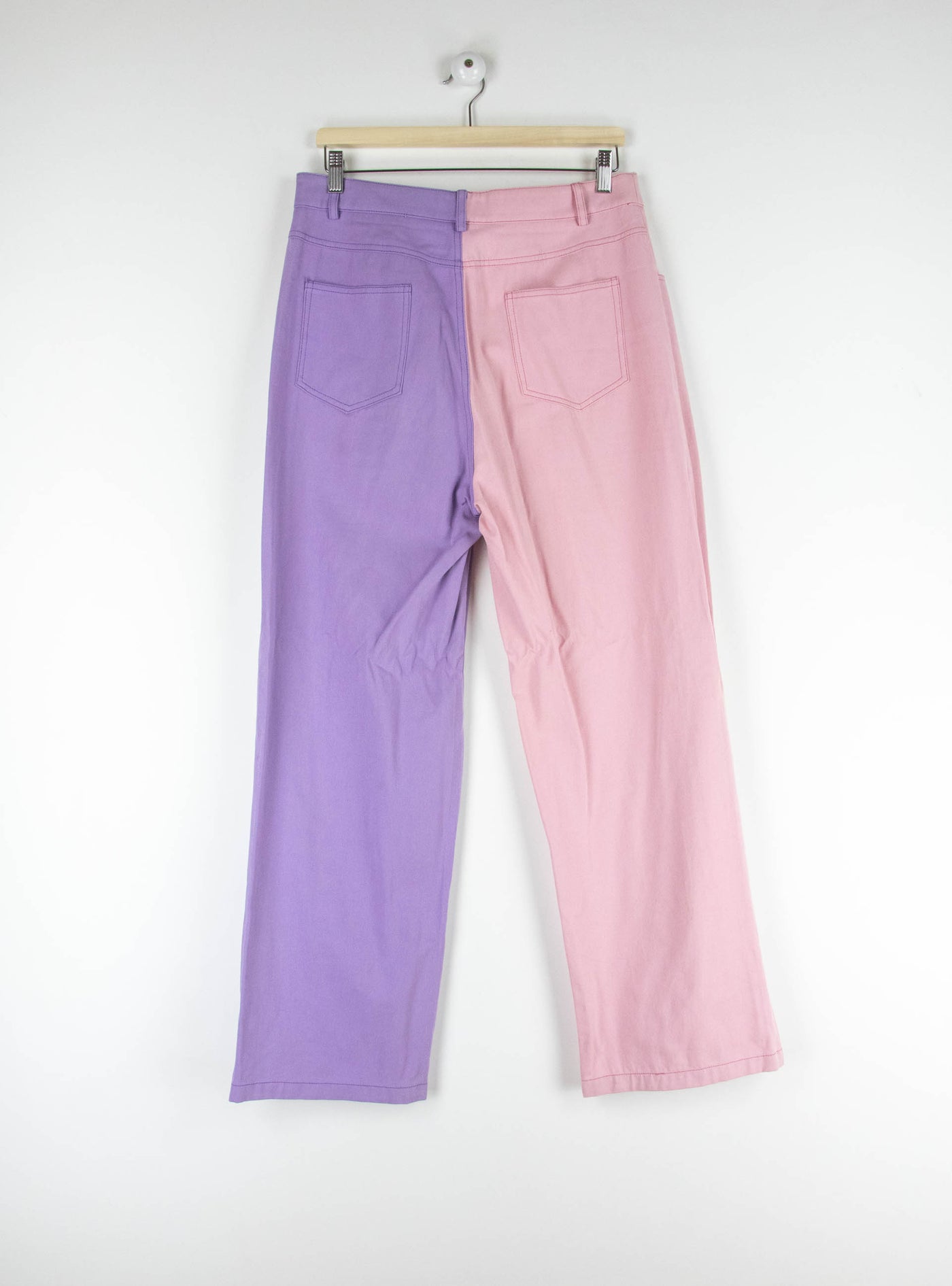 Pantalón vaquero dos colores morado/rosa