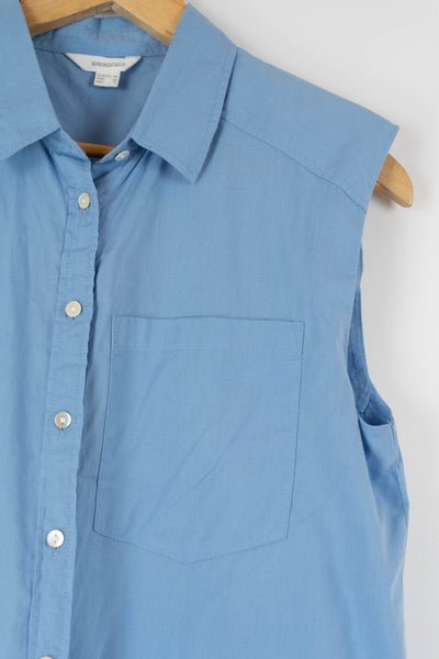 Camisa con hombreras y sin mangas azul