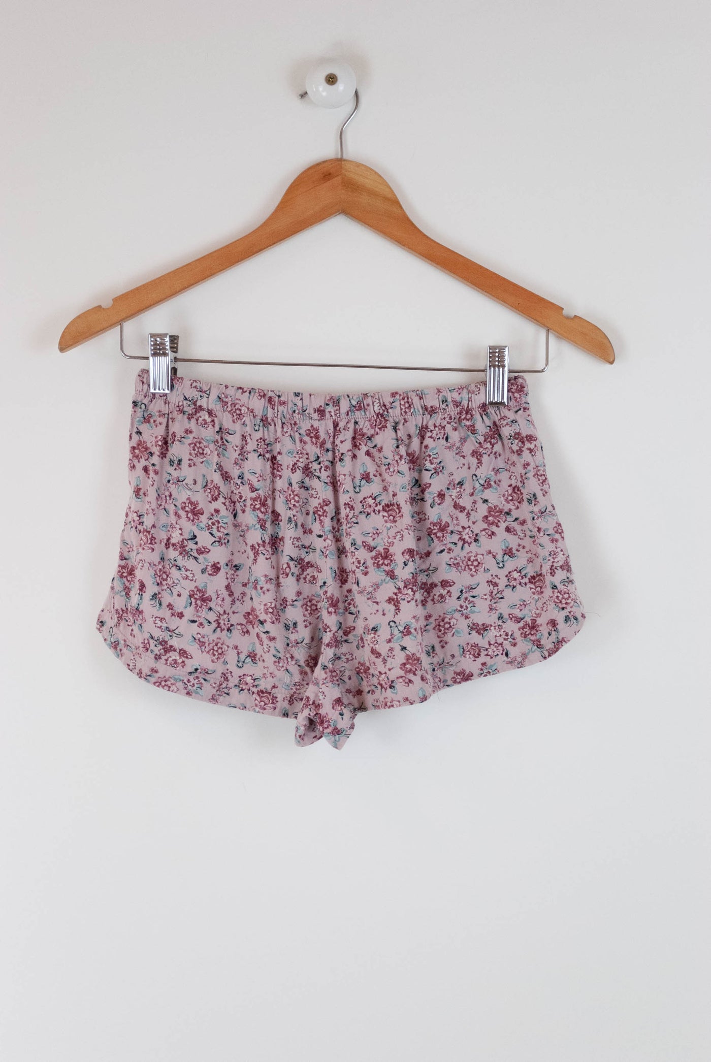 Pantalón corto rosa estampado flores