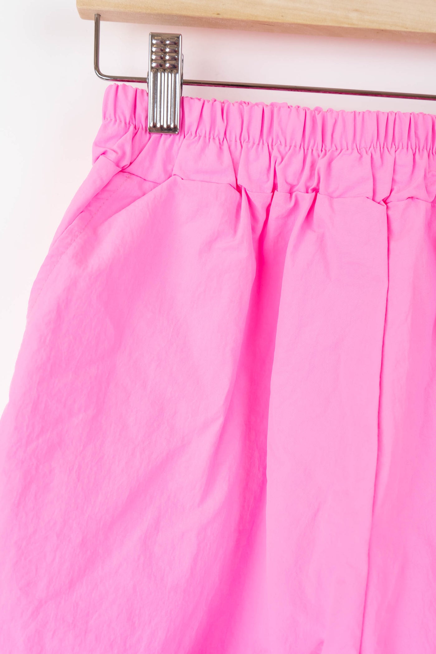 Conjunto top y pantalón rosa neón
