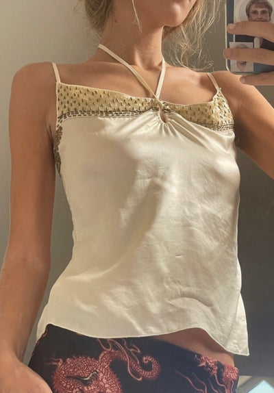 Blusa corta vintage blanca de seda con cuentas doradas