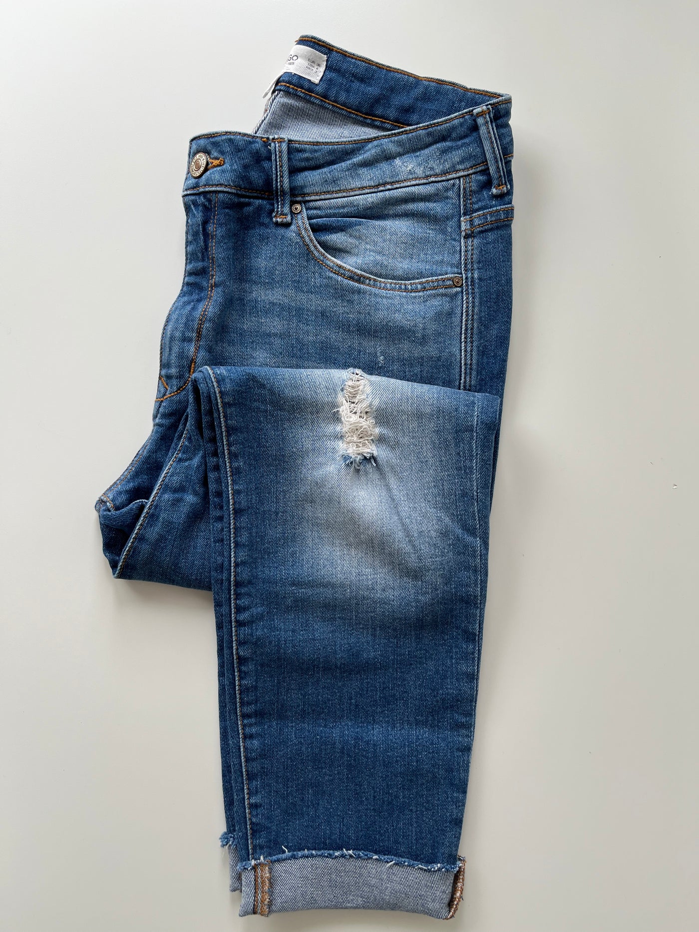 jeans boyfriend tiro bajo parte lateral