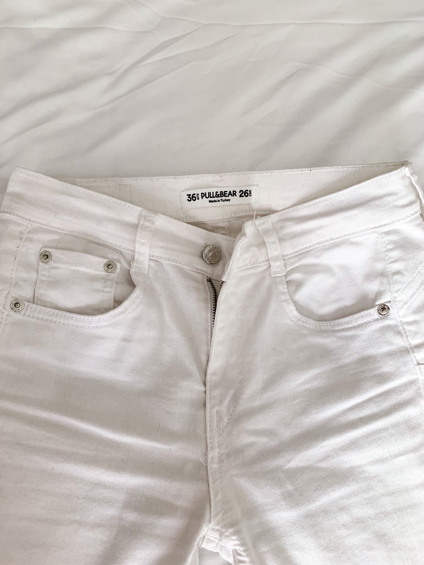 Jeans blancos rotos
