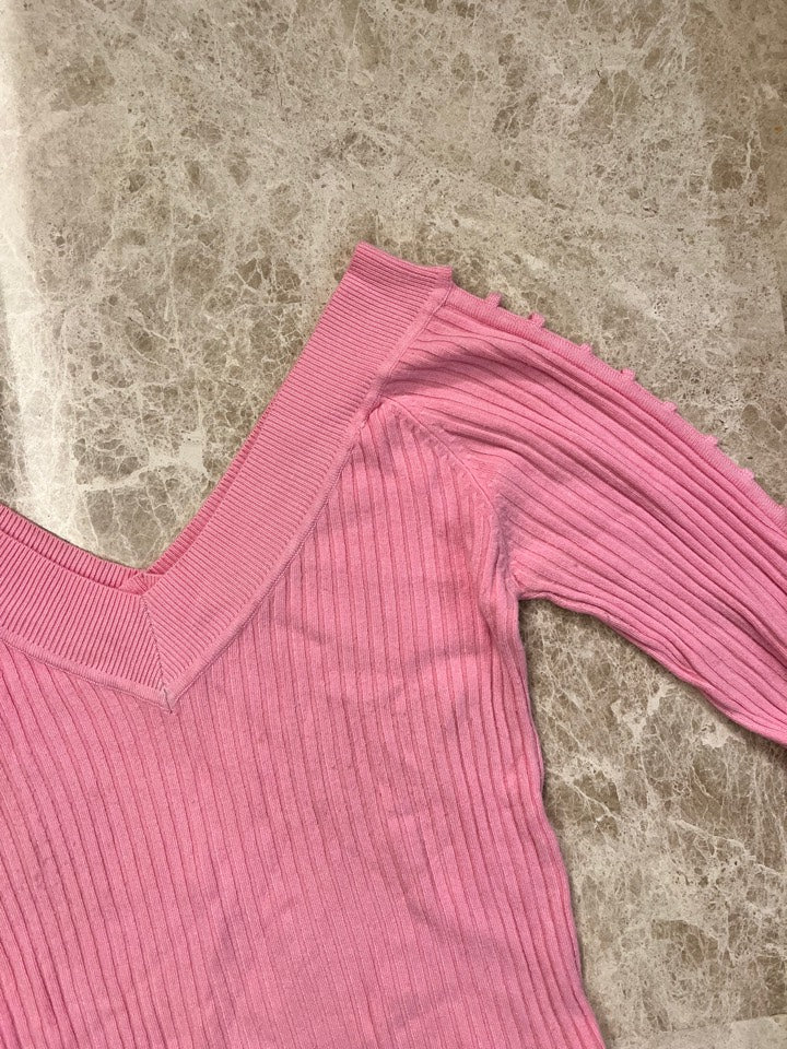 Jersey rosa cuello pico