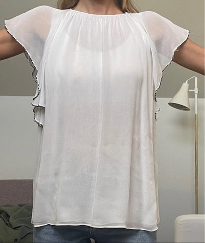 Blusa blanca de manga corta de Nícoli